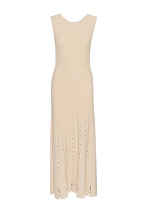 Ärmlös, knälång klänning i ljus beige stickad tyg. Har strukturerade vertikala ränder och små utskurna mönster överallt.