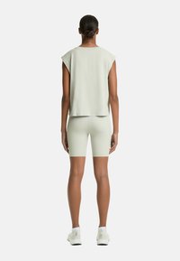 OYSHO SLEEVELESS SEAMLESS - Basic póló - green