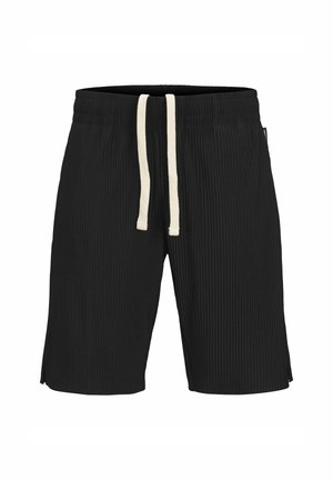 Black ribbed shorts with an elastic waistband, featuring a contrasting beige drawstring and side slits at the hem for added movement.