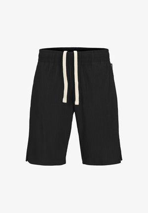 Zwarte geribbelde shorts met een elastische tailleband, voorzien van een contrasterende beige trekkoord en zijsplitten aan de onderkant voor extra bewegingsvrijheid.