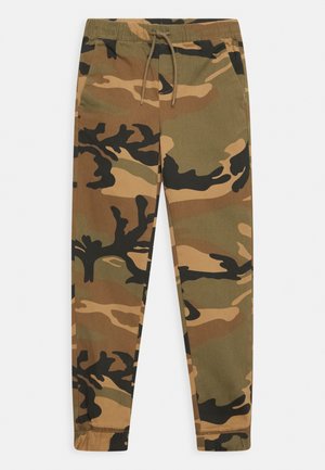 Pantalons de survêtement camouflage avec une taille élastique et un cordon de serrage. Présente des nuances de marron, vert et noir dans un motif camouflage audacieux.