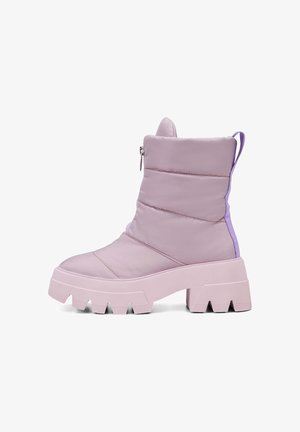 Purple padded ankle boot with a chunky sole, side zipper, and textured accents. Features a higher back for support and heel height.