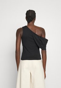 Iro Triko s potiskem - black
