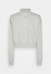 Sweatshirt gris court avec col montant, fermeture éclair mi-hauteur à l'avant et poignets côtelés. Présente un petit logo blanc sur la poitrine gauche. Texture douce.