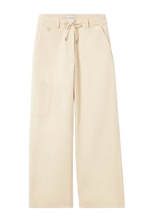 Pantalons larges beiges en coton, avec une taille élastique à cordon de serrage, deux poches avant et une poche cargo latérale.