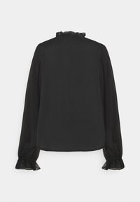 Svart blus med lång ärm, rynkad halsringning och genomskinliga ärmar. Manschetterna har en mjuk, samlad detalj. Slätt, lätt tyg.