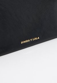 Bimba Y Lola BIMBA Y LOLA - Toiletti-/meikkilaukku - black