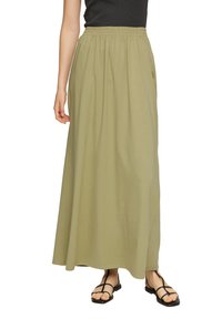 Lange, olijfgroene katoenen maxi-jurk met een elastische tailleband en zijzakken, met een zachte textuur en een vloeiende silhouet.