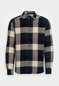 Camicia con bottoni in misto lana con un grande motivo a quadri nei colori navy, nero, grigio e crema, maniche lunghe e collo classico.