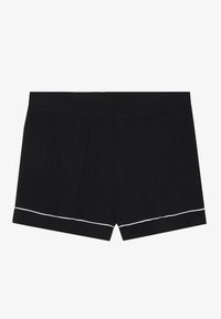 Schwarze Shorts aus weichem Stoff mit lockerem Sitz. Besondere Details sind der weiße Besatz entlang des Saums.