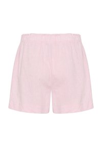 Light pink linen shorts with an elastic waistband. Features a relaxed fit and a smooth, slightly textured surface. No pockets or embellishments.