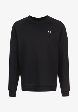Sweatshirt noir en tissu doux avec manches raglan, col rond, poignets côtelés et une petite écusson logo sur la poitrine.