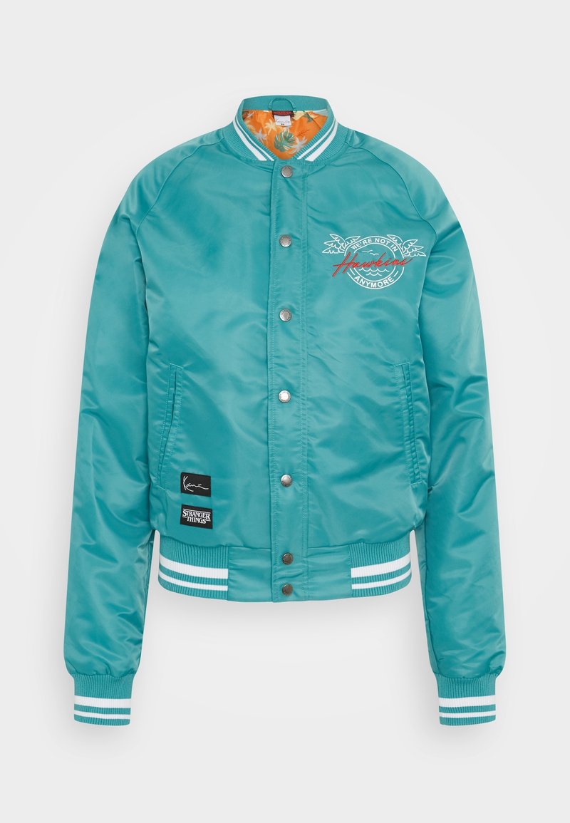 Teal bomber jacket with snap closures, ribbed cuffs, and striped hem. Features a floral interior lining and embroidered logo detail.