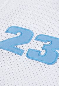 White mesh jersey featuring light blue embroidered numbers "2" and "3" with a textured finish, highlighting breathable material and craftsmanship.