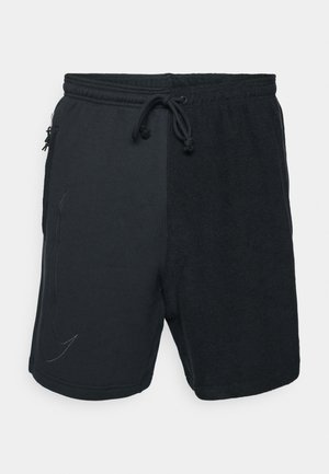 Sorte shorts med en kombination af glat og struktureret stof, elastisk talje med snor og en diskret logo-detalje.