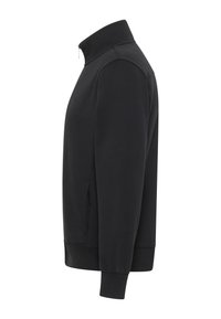Giacca in fleece nera con colletto alto, chiusura a zip, tasche laterali, polsini a costine e vestibilità dritta, caratterizzata da un design minimalista.