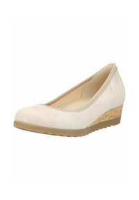 Chaussure compensée beige pour femme à bout rond, talon compensé en liège et semelle en caoutchouc avec semelle à relief, visible sur fond blanc.