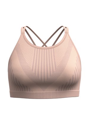 Light beige sports bra with textured patterns, featuring a crisscross strap design and a smooth, elastic underband.