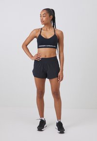 Under Armour VANISH LOW - Sutien sport cu susținere scăzută - black/white