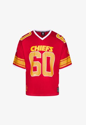 Red short-sleeve jersey with white accents and yellow lettering. Displays "CHIEFS" above number "60" in bold, mesh-textured fabric.