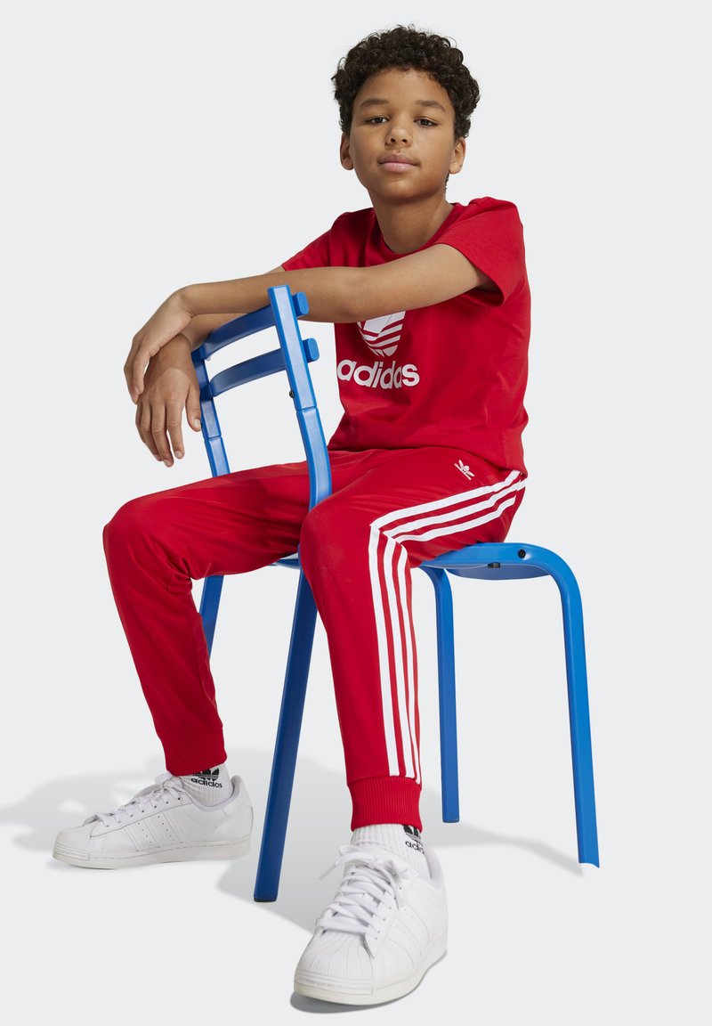 adidas Originals SUPERSTAR - Pantalones deportivos - better scarlet/rojo -  Zalando.es