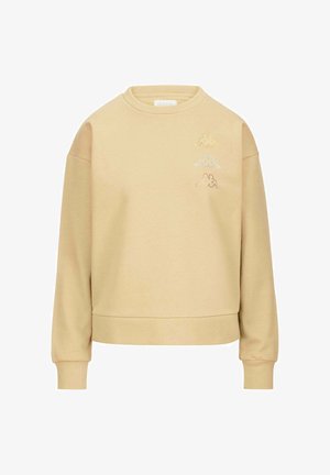Sudadera beige hecha de una tela suave, con cuello redondo y mangas largas. Tres pequeños logotipos bordados en la parte frontal.