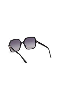 Black square sunglasses with a glossy finish, gradient gray lenses, and slender black arms. Features slight metallic accents at hinges.