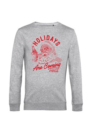 Grijze sweatshirt met een illustratie van de kerstman die een Coca-Cola-fles vasthoudt. De tekst "Holidays Are Coming" staat in het rood. Eenvoudig ontwerp met ronde hals.