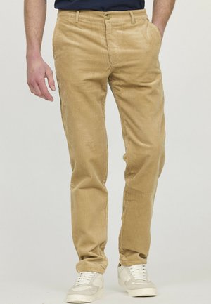 Pantalons en velours côtelé beige avec texture à côtes verticales, coupe droite, deux poches latérales et fermeture à bouton à la taille.