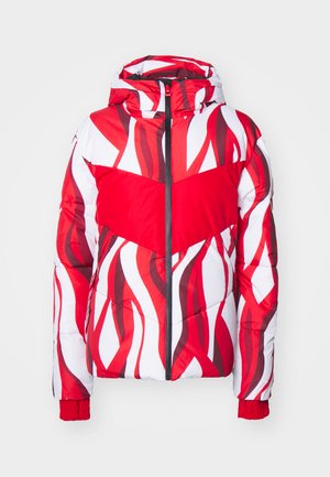 Jachetă pufoasă cu un model ondulat vibrant în roșu și alb, cu fermoar frontal și glugă. Țesătură texturată cu manșete elastice pentru o ajustare confortabilă.