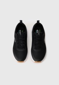 Black athletic shoes with a mesh upper, rounded toe, and cushioned white sole. Features black laces and a textured rubber heel accent.