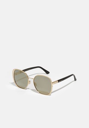 Lunettes de soleil - gold-coloured