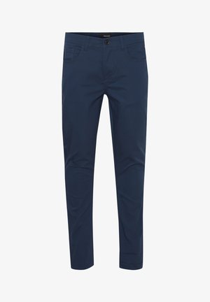 Pantaloni elasticizzati blu navy realizzati in un tessuto morbido. Presentano cinque tasche, passanti per la cintura e una chiusura con bottone. Design slim fit.