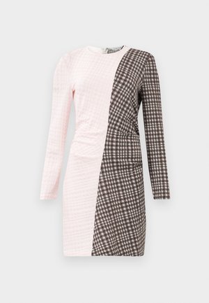 Pink and brown checkered dress with long sleeves, featuring a textured surface and a diagonal split design. Zipper closure at the back.