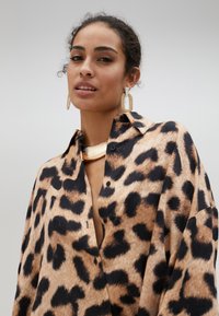LOLA CASADEMUNT Paitapusero - leopard