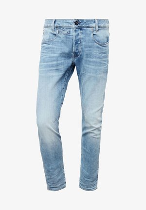 Light blue denim jeans with a slim fit, five-pocket design, and subtle distressing. Features a button closure and stitched accents.