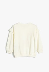 Crème-kleurige sweatshirt met lange mouwen, gerimpelde accenten op de schouders, geribbelde manchetten en een ronde halslijn. Glad stoftextuur.