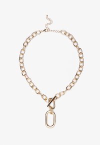 Goldkette mit großen Gliedern und einem zentralen abstrakten Verschluss mit einem verlängerten ovalen Akzent. Verstellbare Länge.