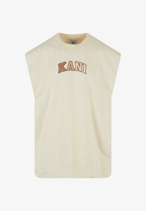 Keltainen lyhythihainen toppi, jossa on pystysuorat valkoiset raidat ja pyöreä pääntie. Etuosassa on sana "KANI" ruskealla kirjaimilla.