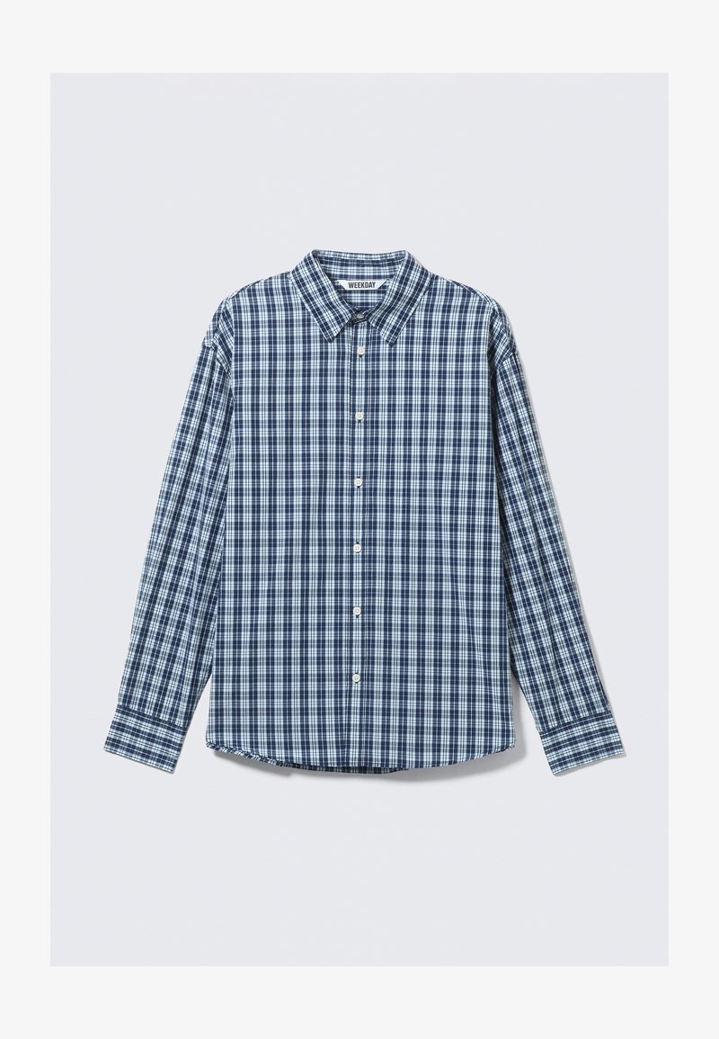 Chemise à manches longues à carreaux bleus et blancs avec col, boutonnage et manches à poignets. Tissu en coton avec une texture lisse.