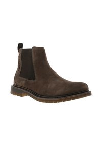 Bottine chelsea en daim marron avec des panneaux élastiques sur les côtés, des détails de couture contrastants et une semelle en caoutchouc texturée. Talon bas et languette à l'arrière.