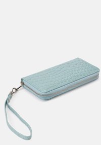 Light blue wallet with a textured, woven pattern. Features a zipper closure and a wrist strap for easy carrying. Smooth material.