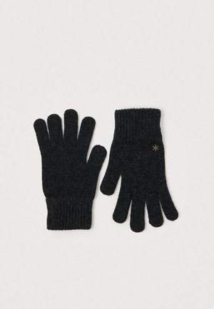 Schwarze Strickhandschuhe mit gerippten Bündchen, die ein hellrosa Sternemblem im Handgelenksbereich tragen. Hergestellt aus einem weichen, strukturierten Material.