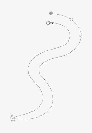 Ezüst pillangó függős nyaklánc, finom lánccal, apró, kerek szemekkel. Karperec és állítható hosszúság a sokoldalúság érdekében.