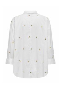 Camicia bianca a maniche lunghe con piccole ricami di ananas giallo in tutta la superficie, con colletto classico e polsini arrotolati.