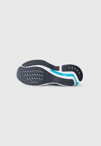 Black rubber sole with textured tread, white midsole featuring blue accents, and a curved shape for flexibility.