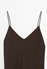 Dark brown sleeveless top with thin spaghetti straps and a V-shaped neckline on a white background.