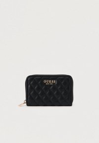 Μαύρο καπιτονέ πορτοφόλι από συνθετικό υλικό, με χρυσό λογότυπο και κλείσιμο με φερμουάρ. Υφή με διαμάντι μοτί βο.