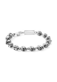 Silver bracelet featuring skull charms, intricately detailed with black accents. Secured with a rectangular clasp. Smooth surface finish.