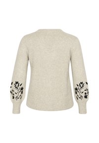 Ljusgrå tröja med långa ärmar, prydd med svart blomsterbroderi på manschetterna. Mjuk textur och enkel rund halsringning.